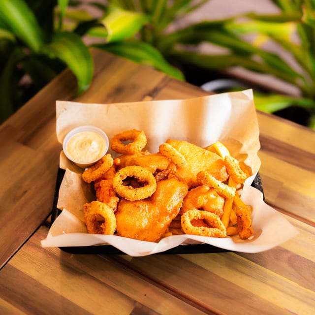 Seafood Parcel With Sweet Potato Chips.