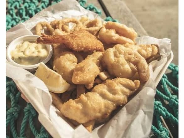 Seafood Parcel With Onion Rings.